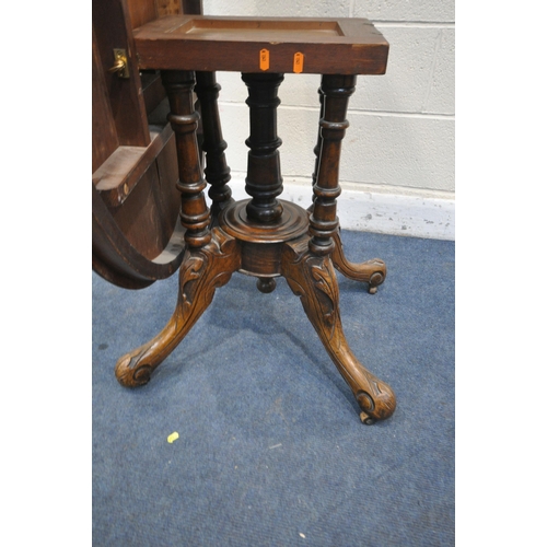 1273 - A VICTORIAN WALNUT AND MARQUETRY INLAID OVAL TILT TOP LOO TABLE, with four foliate carved legs, leng... 