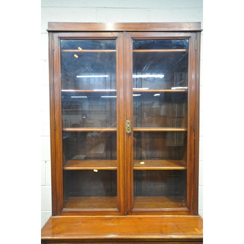 1282 - A 20TH CENTURY WALNUT SECRETAIRE BOOKCASE, the top with two glazed doors, enclosing four shelves, th... 