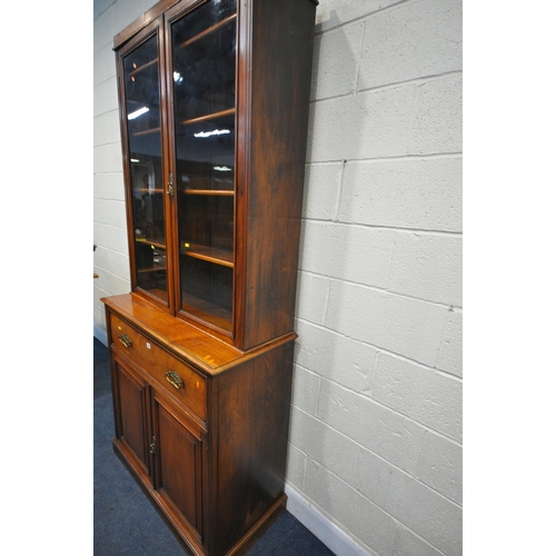 1282 - A 20TH CENTURY WALNUT SECRETAIRE BOOKCASE, the top with two glazed doors, enclosing four shelves, th... 