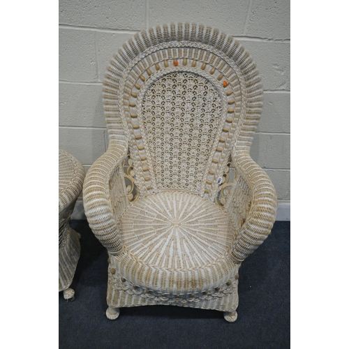 1286 - A WICKER SPOON BACK ARMCHAIR, width 73cm x depth 72cm x height 103cm, along with a matching side tab... 