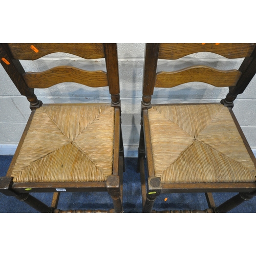 1291 - A PAIR OF OAK RUSH SEATED BAR STOOLS, height 104cm (condition - minor signs of use) (2)