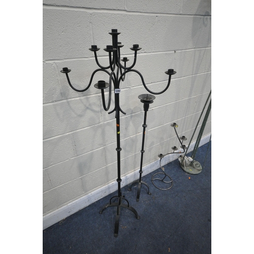 1292 - A WROUGHT IRON NINE BRANCH CANDELABRA, height 144cm, a smaller wrought iron candle stand, a steel sp... 