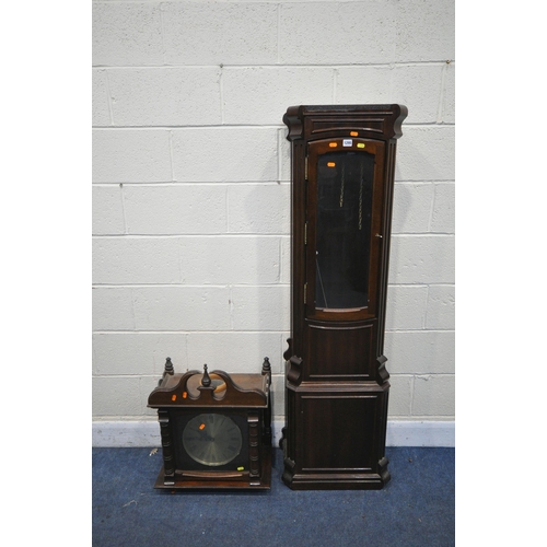 1295 - A MODERN MAHOGANY GRANDFATHER CLOCK, with a brassed ten inch dial, with Roman numerals, the top sect... 