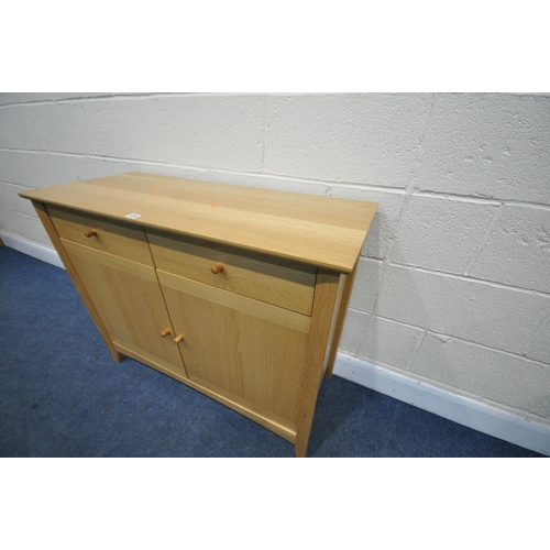 1297 - A JOHN LEWIS LIGHT OAK SIDEBOARD, with two drawers over two cupboard doors, length 101cm x depth 43c... 