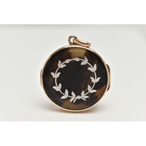 1 - AN EARLY 20TH CENTURY 9CT GOLD TORTOISESHELL LOCKET, of a circular form, tortoiseshell decorated wit... 