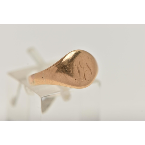 12 - AN 18CT GOLD SIGNET RING, circular signet with worn engraved initials, polished band, hallmarked 18c... 