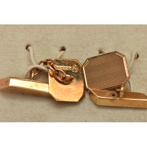 36 - A PAIR OF 9CT GOLD CUFFLINKS, yellow gold rectangular cufflinks, engine turned pattern with cut off ... 