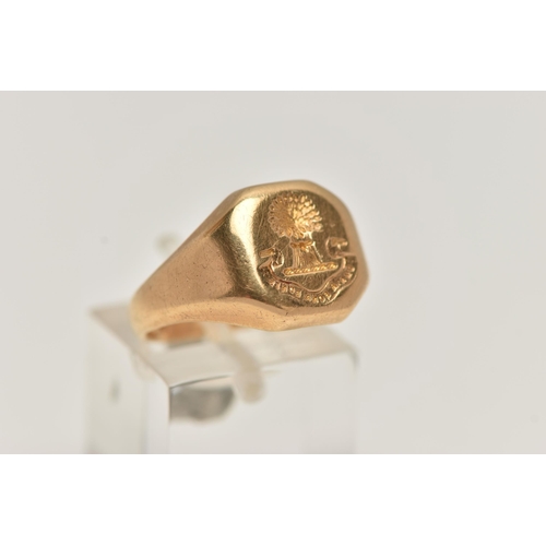 37 - A HEAVY 18CT GOLD INTAGLIO SIGNET RING, square signet with cut off corners, intaglio reads 'Omnia Bo... 