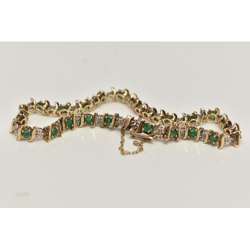 44 - A 9CT GOLD EMERALD AND DIAMOND LINE BRACELET, alternating circular cut emeralds and single cut diamo... 