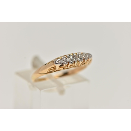 45 - A EARLY 20TH CENTURY FIVE STONE DIAMOND BOAT RING, five diamonds prong set in white metal, raised ye... 