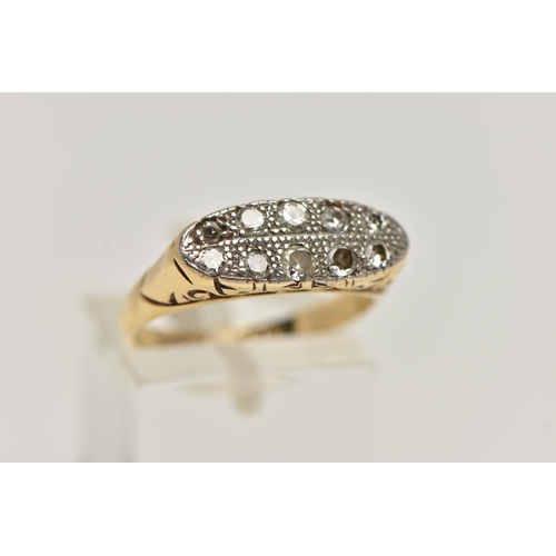 46 - A TEN STONE DIAMOND RING, ten transitional cut diamonds, grain set in white metal, raised yellow met... 