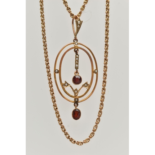 73 - A YELLOW METAL LAVALIER PENDANT AND CHAIN, oval openwork pendant set with garnets and split pearls, ... 