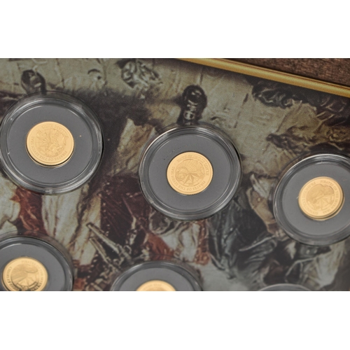 117 - A BOXED SMALL GOLD COIN COLLECTION OF 12 X 0.5 gram, Ivory coast proof coins   Pirates of the Seven ... 