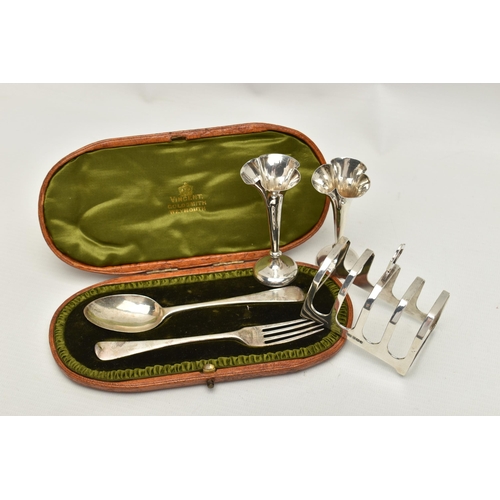 162 - AN ASSORTMENT OF SILVER ITEMS, to include a cased christening set, a spoon and fork, hallmarked 'Hol... 