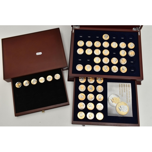 172 - A GLAZED BOXED SET OF ENHANCED KENNEDY HALF DOLLAR COINS, to include gold highlighted with uncircula... 