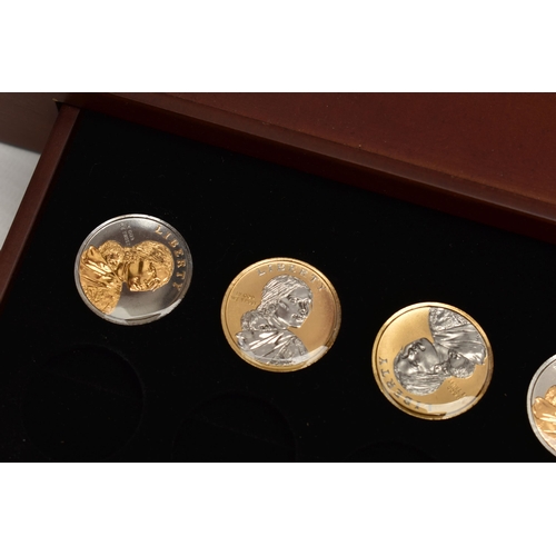 172 - A GLAZED BOXED SET OF ENHANCED KENNEDY HALF DOLLAR COINS, to include gold highlighted with uncircula... 