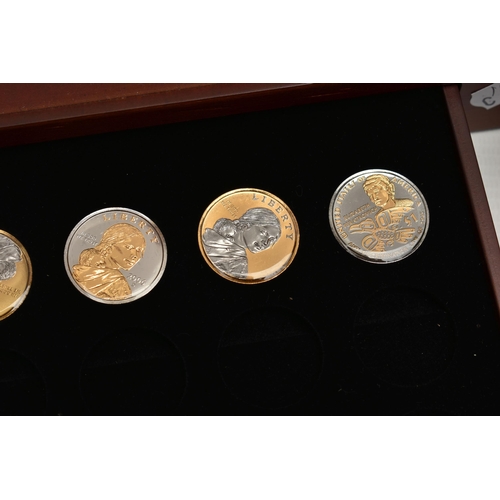 172 - A GLAZED BOXED SET OF ENHANCED KENNEDY HALF DOLLAR COINS, to include gold highlighted with uncircula... 