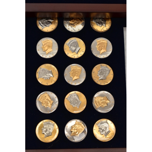 172 - A GLAZED BOXED SET OF ENHANCED KENNEDY HALF DOLLAR COINS, to include gold highlighted with uncircula... 