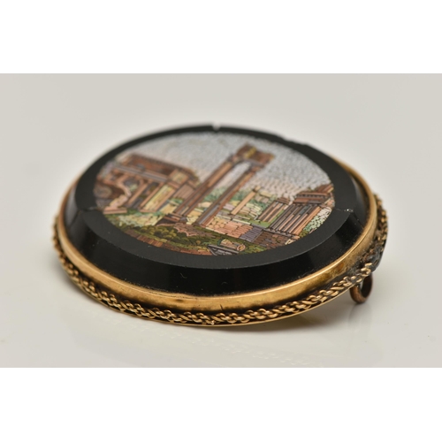 81 - A LATE 19TH CENTURY MICRO MOSAIC BROOCH, depicting the Temple of Vespasian, set in yellow metal with... 