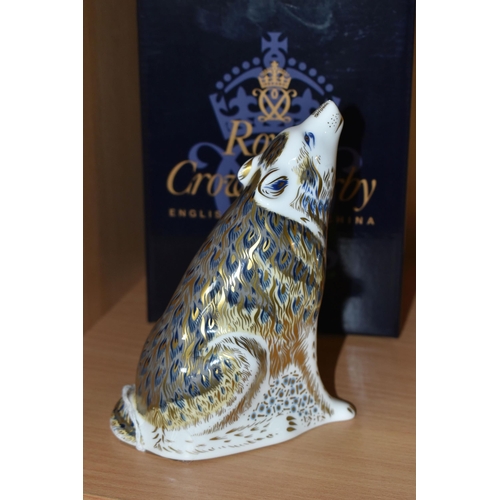 347 - A BOXED ROYAL CROWN DERBY 'WOLF' PAPERWEIGHT, with gold stopper, date cypher 2010, painted and print... 