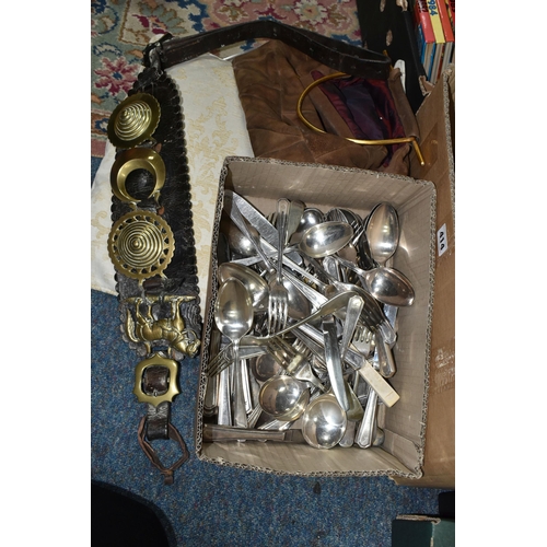 414 - TWO BOXES OF METAL WARES AND SUNDRIES, to include a brass ladle, horse brasses - some attached to le... 