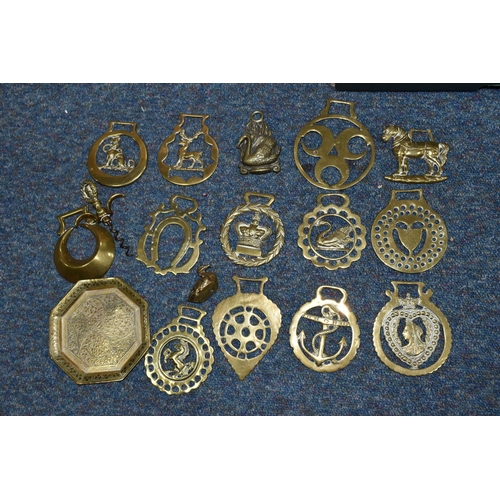 414 - TWO BOXES OF METAL WARES AND SUNDRIES, to include a brass ladle, horse brasses - some attached to le... 