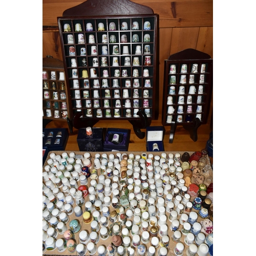 441 - A LARGE COLLECTION OF THIMBLES AND THIMBLE COLLECTOR'S CABINETS, over four hundred porcelain thimble... 