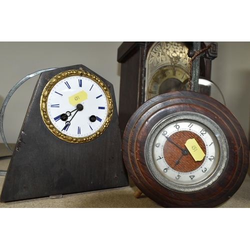 451 - TWO CLOCKS TOGETHER WITH CLOCK PARTS, comprising an Art Deco circular wooden clock (missing base), a... 