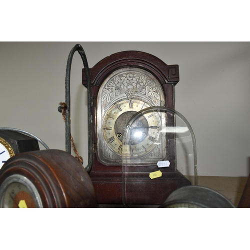 451 - TWO CLOCKS TOGETHER WITH CLOCK PARTS, comprising an Art Deco circular wooden clock (missing base), a... 