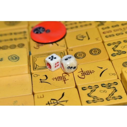 436 - MAH JONG, comprising a 20th century travel set of Mah Jong, appears complete with dice and plastic c... 