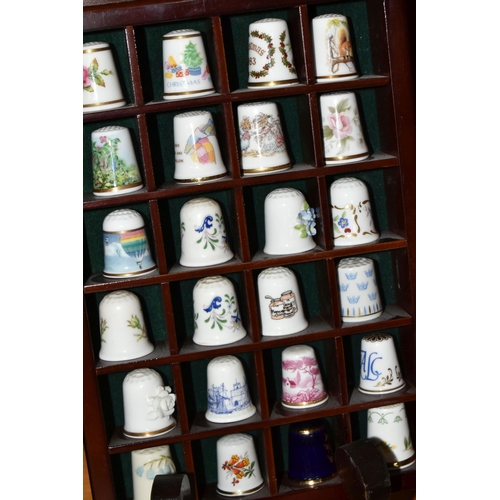 441 - A LARGE COLLECTION OF THIMBLES AND THIMBLE COLLECTOR'S CABINETS, over four hundred porcelain thimble... 