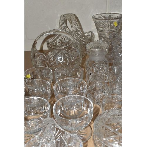 501 - A GROUP OF CUT CRYSTAL AND A SWAROVSKI FIVE POINT CANDLE HOLDER, comprising six grapefruit dishes (o... 