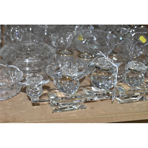 501 - A GROUP OF CUT CRYSTAL AND A SWAROVSKI FIVE POINT CANDLE HOLDER, comprising six grapefruit dishes (o... 