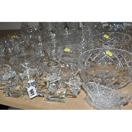 501 - A GROUP OF CUT CRYSTAL AND A SWAROVSKI FIVE POINT CANDLE HOLDER, comprising six grapefruit dishes (o... 