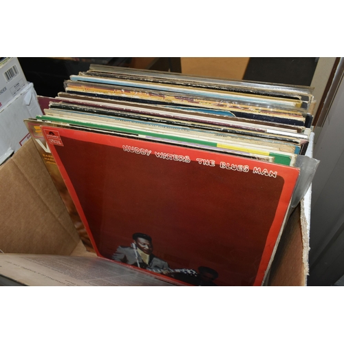 511 - A BOX OF RECORDS, to include approximately fourteen vinyl singles and thirty six LPs, artists to inc... 