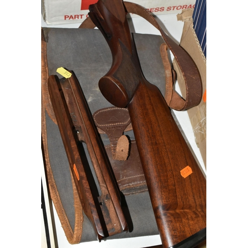 513 - A WALNUT FOREND AND GUN STOCK WITH A BISLEY CANVAS AND LEATHER TRIMMED SLIP, the forend stamped 791 ... 