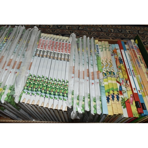 548 - A QUANTITY OF ASSORTED RUPERT BOOKS AND ANNUALS, assorted books and annuals from the 1940's onwards,... 