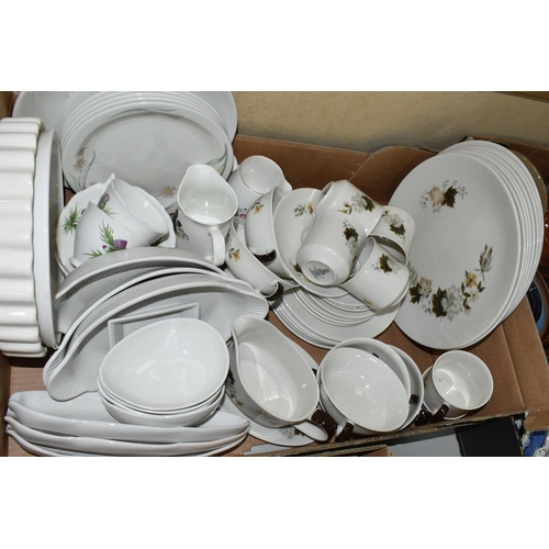 557 - FOUR BOXES OF CERAMIC DINNER WARES, to include a forty six piece Royal Doulton Tumbling Leaves TC100... 