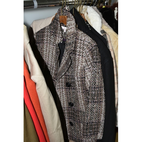 562 - A COLLECTION OF LADIES AND GENTS JACKETS, COATS AND HATS, comprising a ladies Aquascutum raincoat wi... 