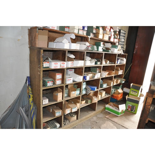 1000 - AN EARLY 20th CENTURY SHOP SHELVING UNIT constructed from painted pine with later adaptations, width... 