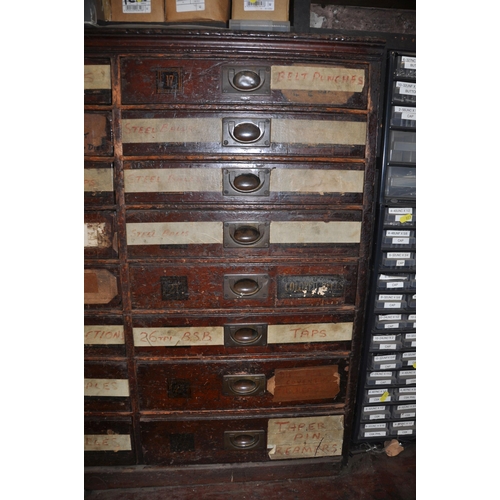 925 - AN EDWARDIAN MAHOGANY HARBERDASHERS CHEST OF TWENTY FOUR DRAWERS with campaign handles to all but on... 