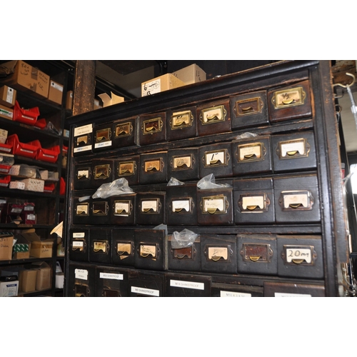 937 - AN EARLY TO MID 20th CENTURY SEVENTY SIX DRAWER CABINET with what appears to be red hardwood drawer ... 