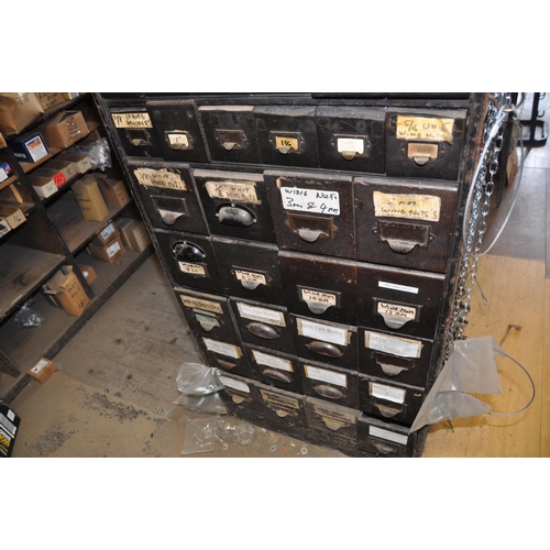 937 - AN EARLY TO MID 20th CENTURY SEVENTY SIX DRAWER CABINET with what appears to be red hardwood drawer ... 