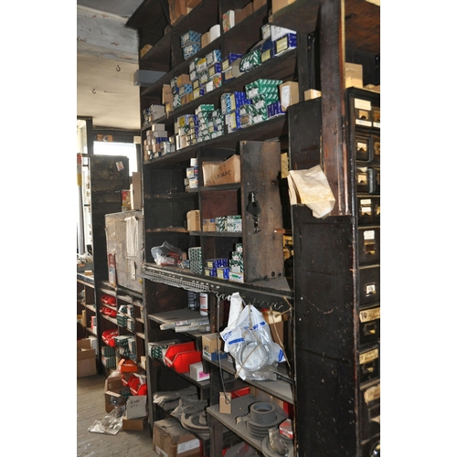 941 - AN EARLY 20th CENTURY SHELVING UNIT (contents not included)constructed from black painted pine, lowe... 