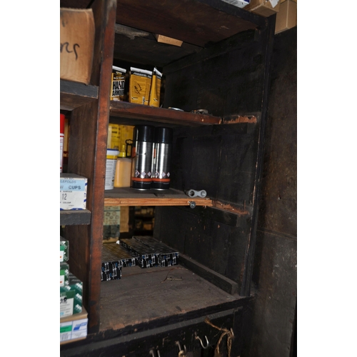 941 - AN EARLY 20th CENTURY SHELVING UNIT (contents not included)constructed from black painted pine, lowe... 