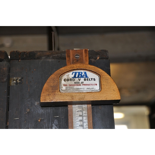 965 - A TBA CORD V BELT MEASURE with metric and Imperial scale, constructed from oak (this lot is located ... 