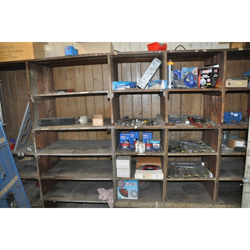 988 - A LARGE EARLY 20th CENTURY SHOP SHELVING UNIT adapted to fit space, constructed of painted pine with... 