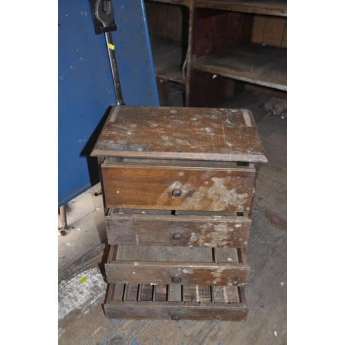 992 - A SMALL EARLY 20th CENTURY OAK COLLECTORS CHEST with four graduated drawers, partitions to lower dra... 