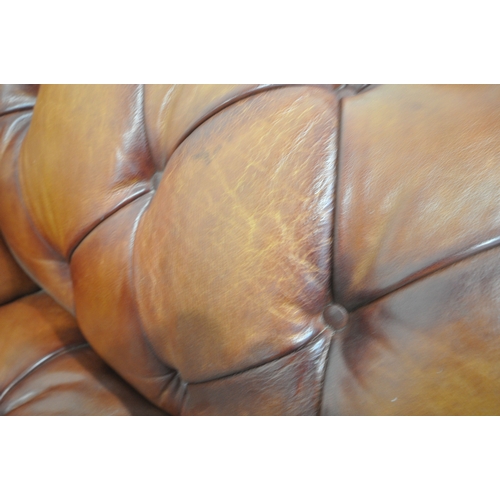 1323 - AN OSKAR TETRAD BUTTONED TANNED LEATHER CHESTERFIELD THREE SEATER SOFA, length 206cm x depth 107cm x... 