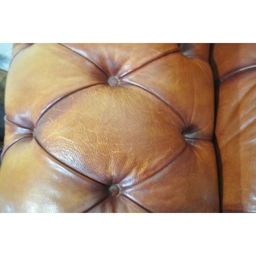 1323 - AN OSKAR TETRAD BUTTONED TANNED LEATHER CHESTERFIELD THREE SEATER SOFA, length 206cm x depth 107cm x... 